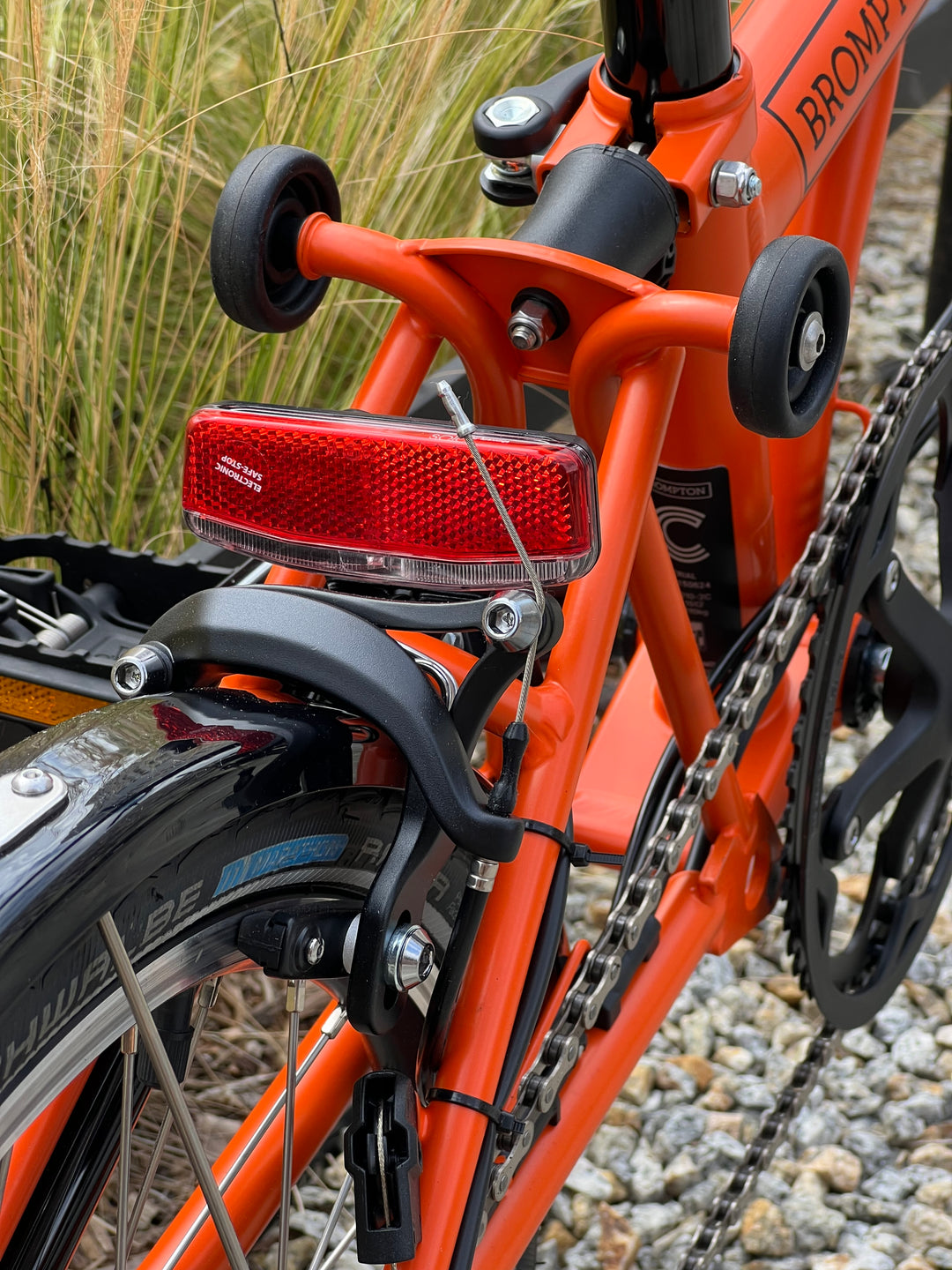 Brompton C-line Explore M6L Sunset Orange (Dynamo w piaście/Brooks)